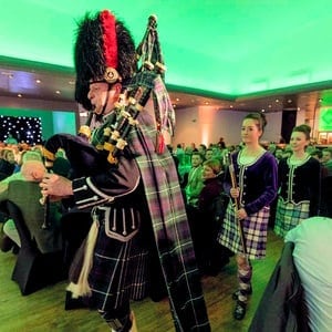 Hire a bagpiper for Corporate Event